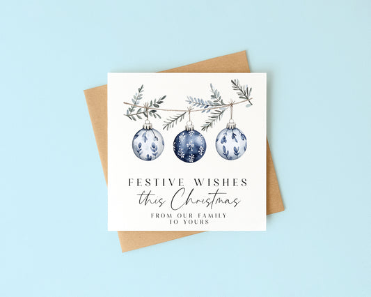Festive wishes blue hanging decoration from our family to yours Christmas Card (with Envelope)