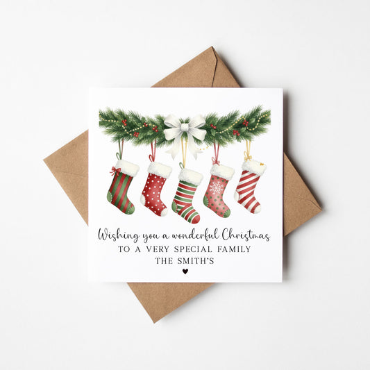 Christmas Card hanging patterned stockings wreath, custom their family name holiday cards