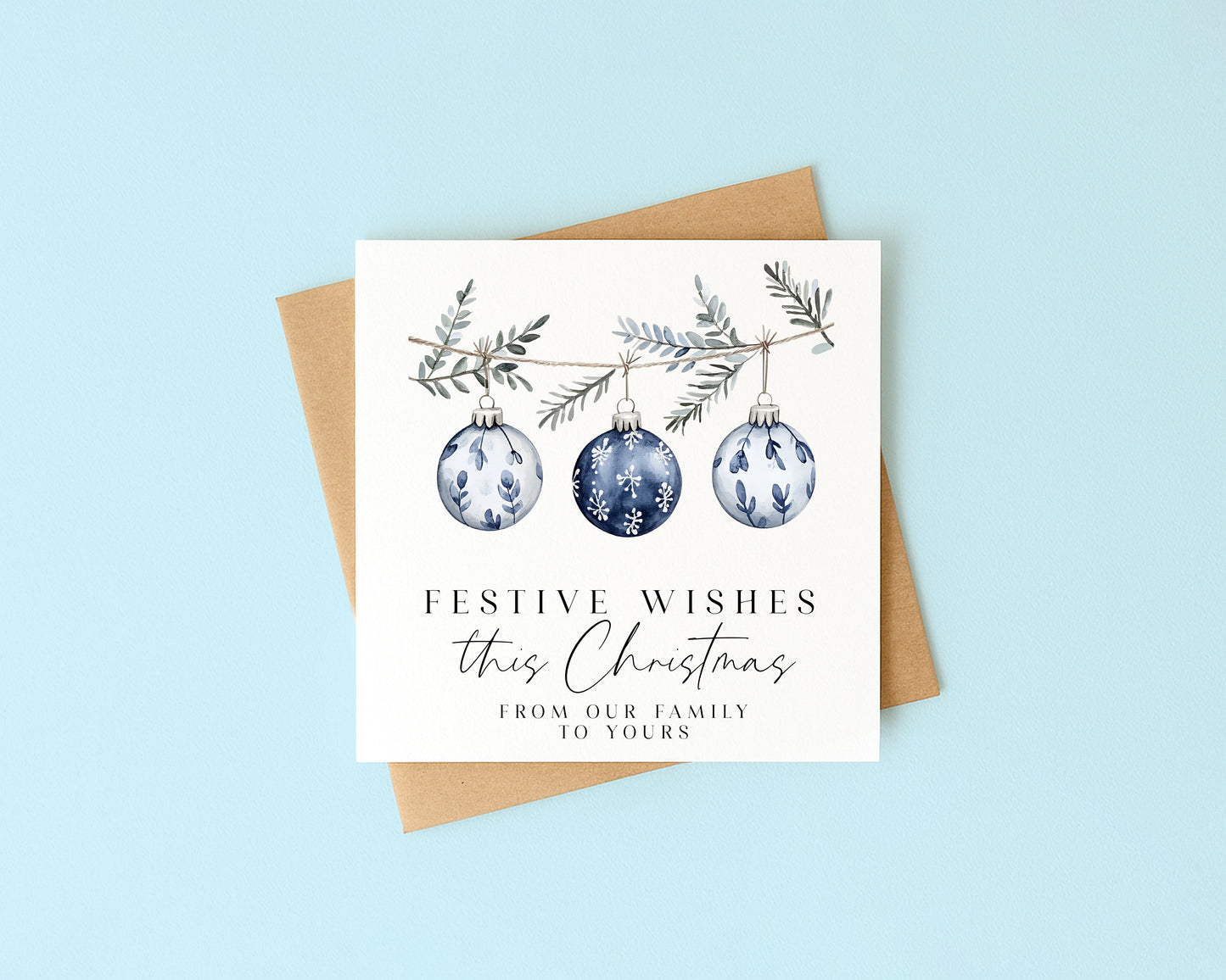 Festive wishes blue hanging decoration from our family to yours Christmas Card (with Envelope)