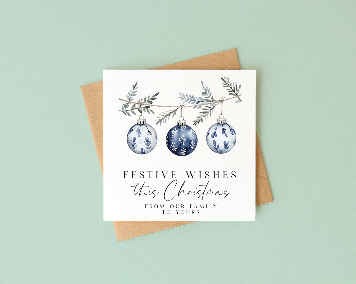 Festive wishes blue hanging decoration from our family to yours Christmas Card (with Envelope)