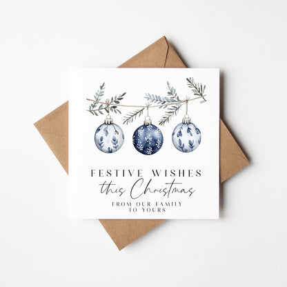 Festive wishes blue hanging decoration from our family to yours Christmas Card (with Envelope)