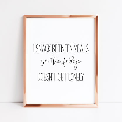 I snack between meals, so my fridge doesn't get lonely funny kitchen unframed wall art poster print