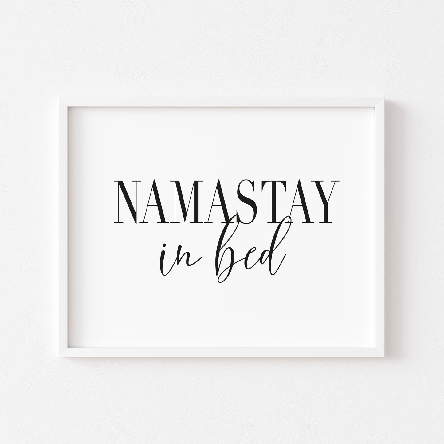 Namastay in bed black font landscape unframed print