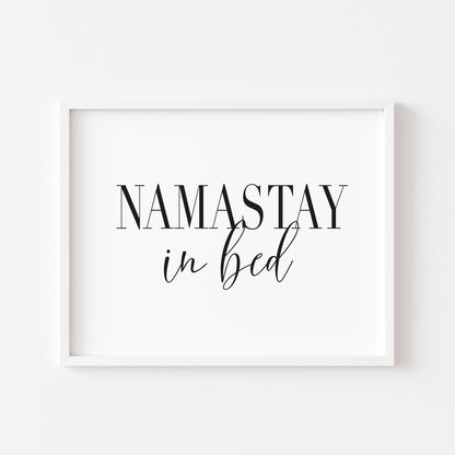 Namastay in bed black font landscape unframed print