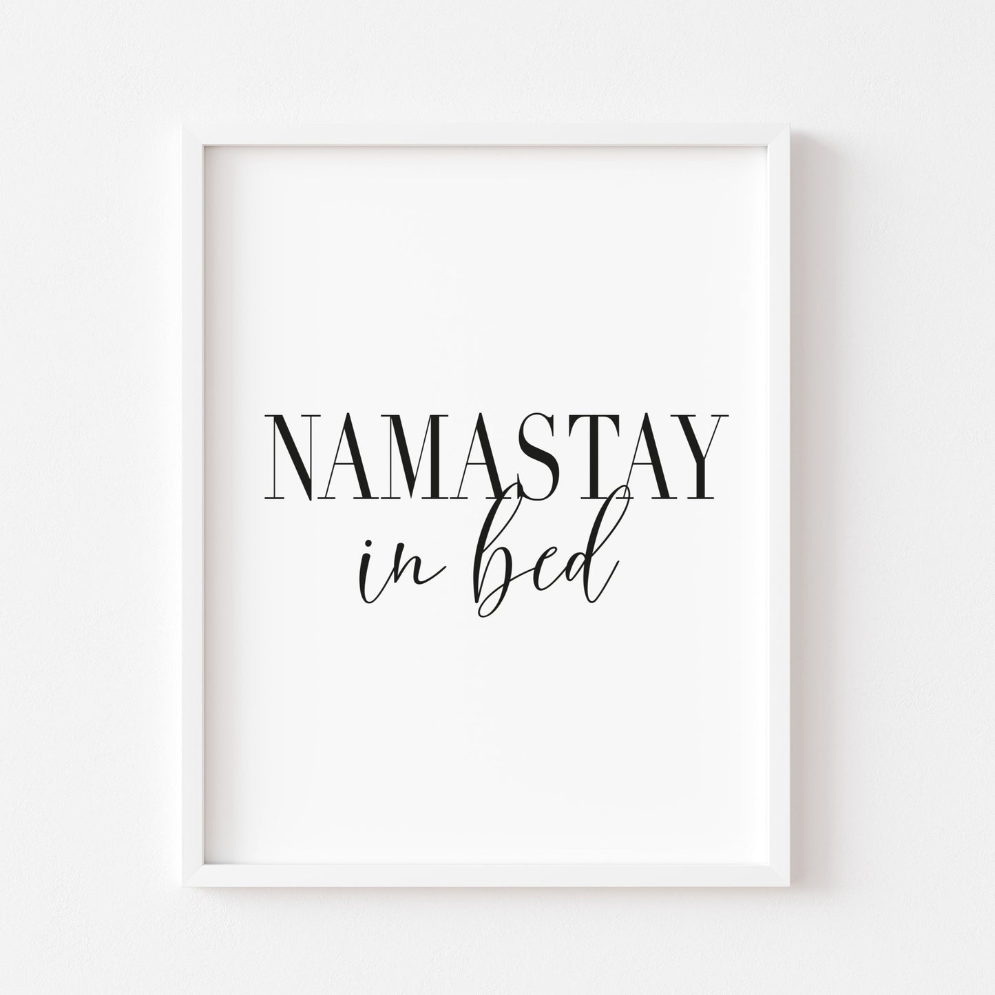 Namastay in bed black font portrait unframed print