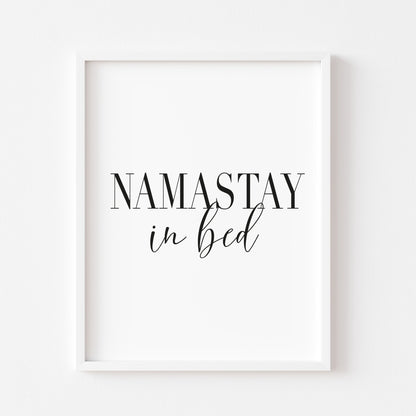 Namastay in bed black font portrait unframed print