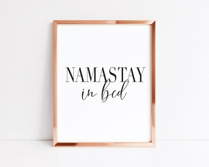 Namastay in bed black font portrait unframed print